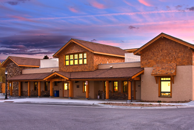 Image of a two story building at dusk