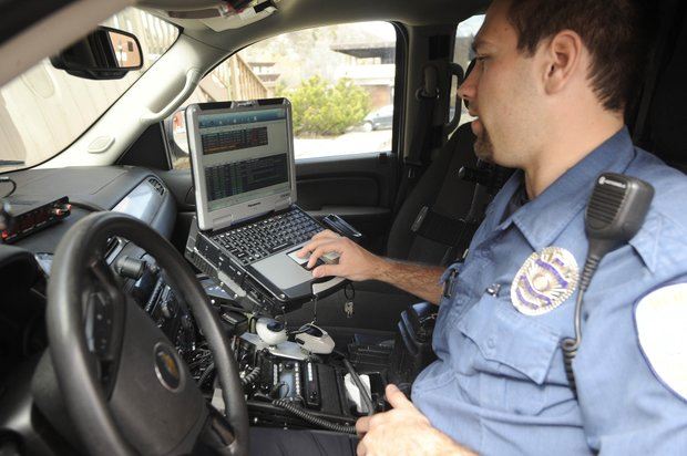 Police Officer in Patrol Car