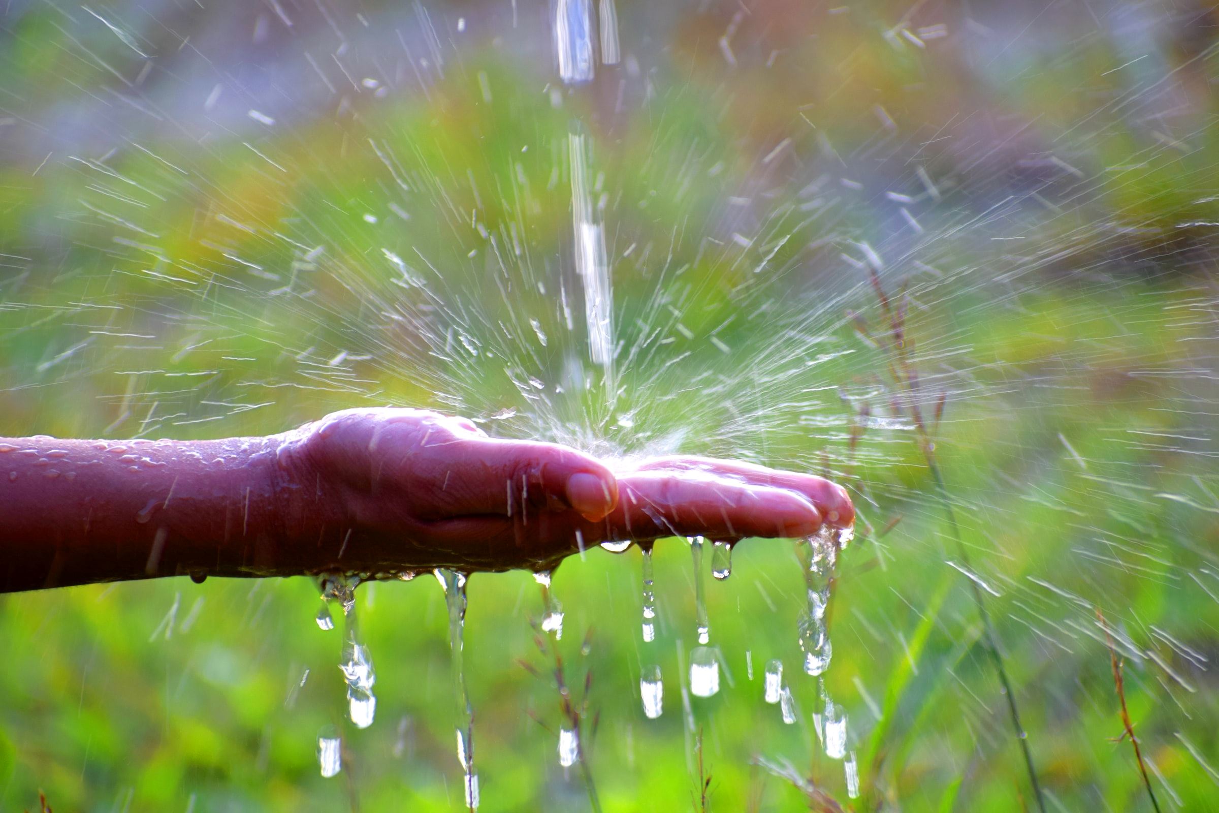 Hand and water