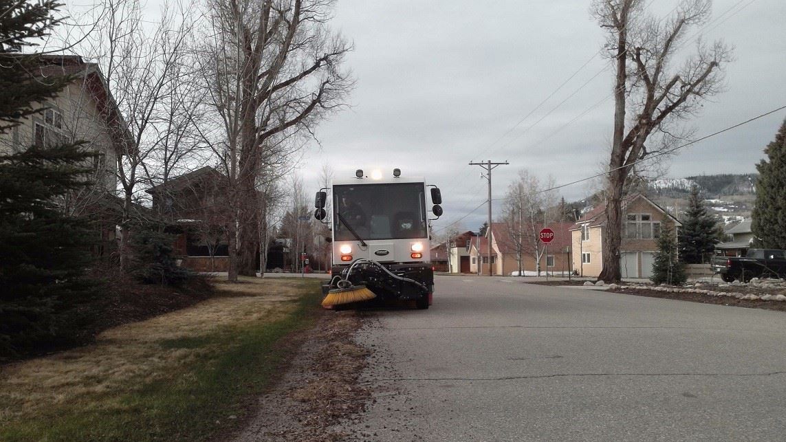 Street Sweeper in summer clearing debris