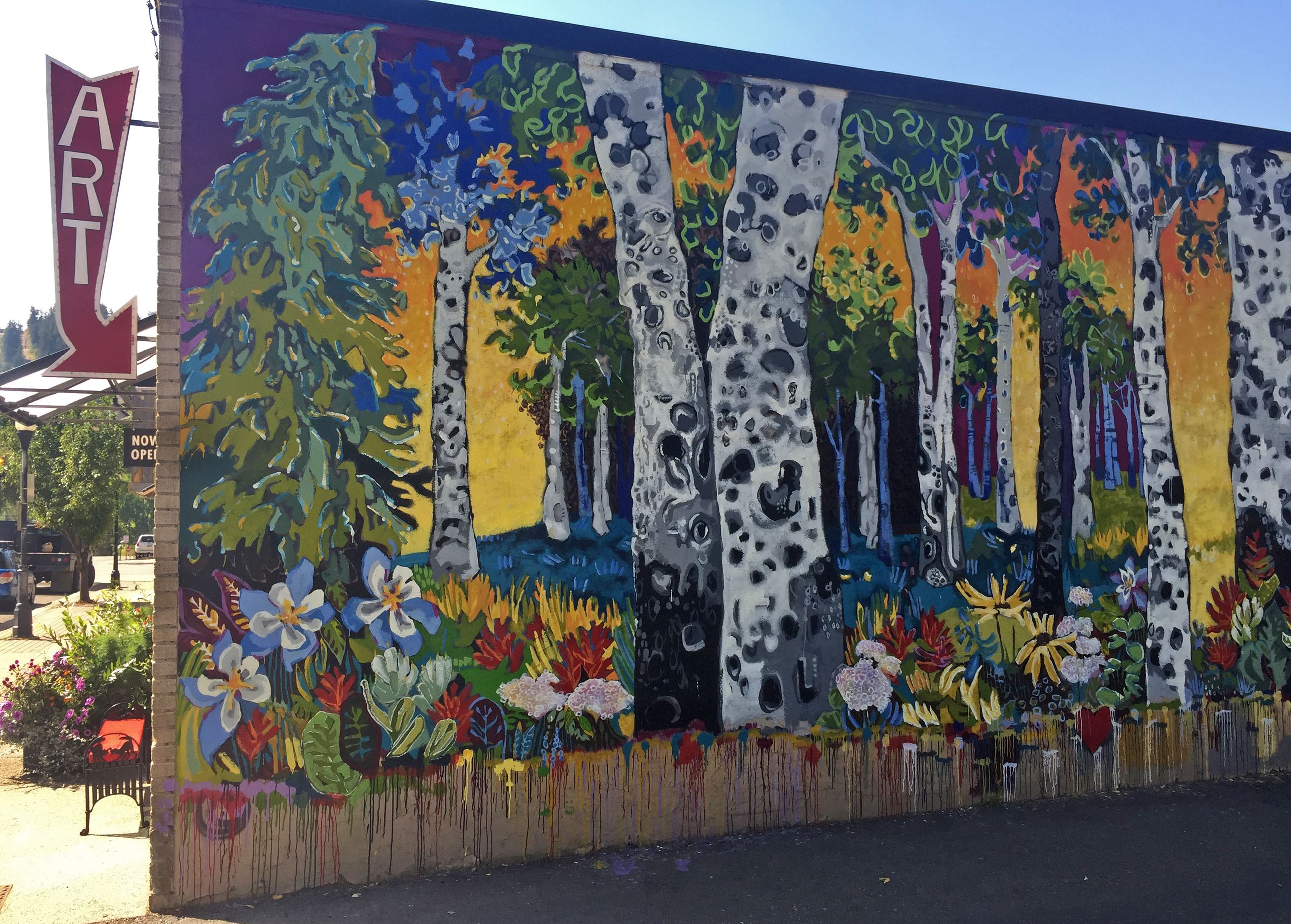 Colorful Public Art Mural of Aspen trees and flowers on 9th Street